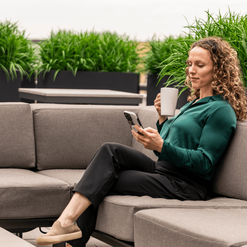 A woman booking MYLO services from her phone