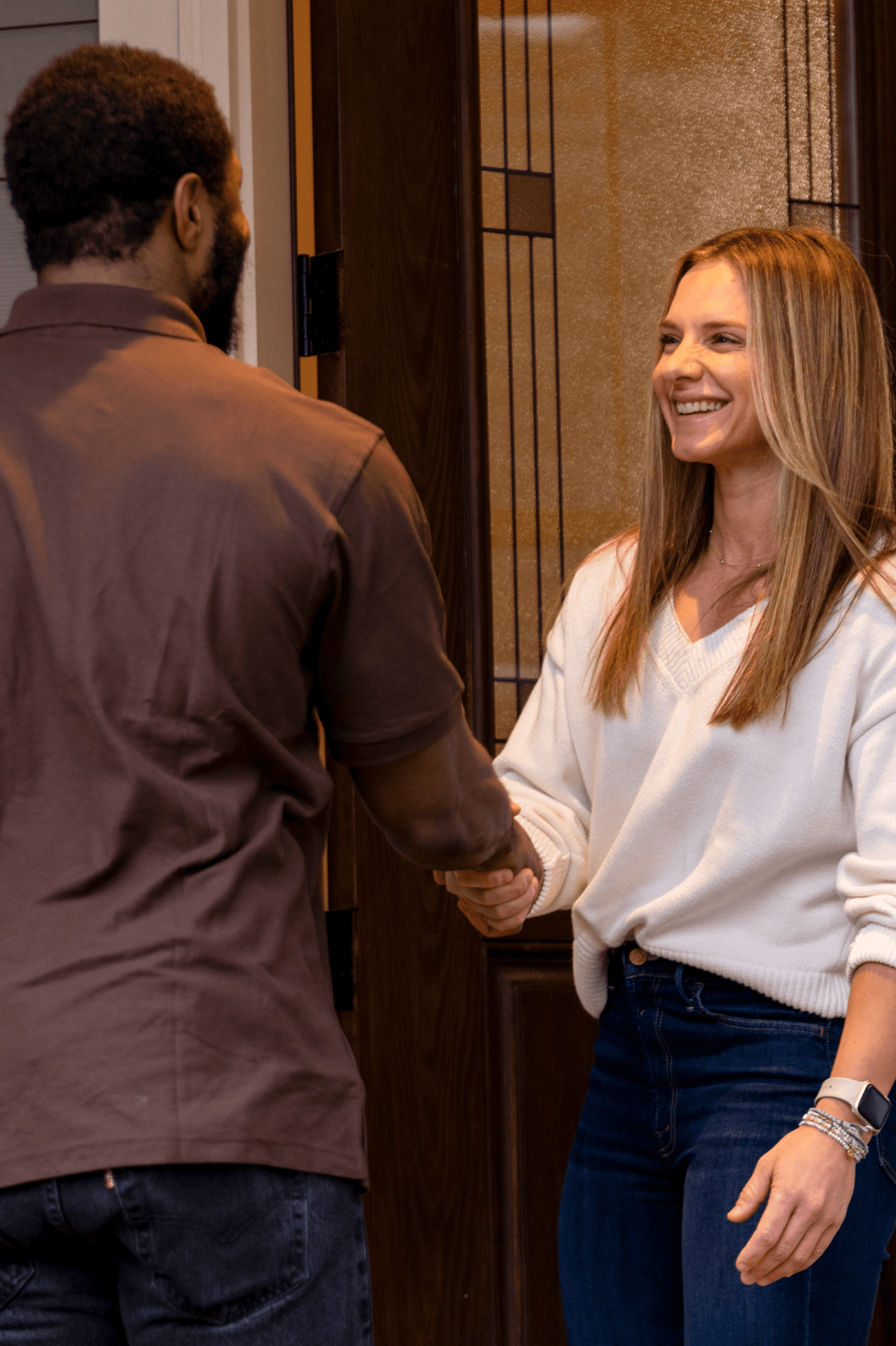 MYLO crew member greeting a customer at her front door